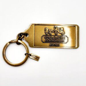 Coach Horse Carriage Hangtag Gold Brass Key Fob, 65th Anniversary